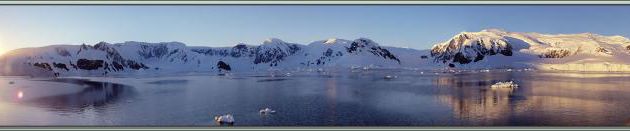 22 février, 6 h 30 du matin: le soleil débouche entre deux sommets - Péninsule Antarctique 