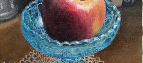 Pomme sur coupelle