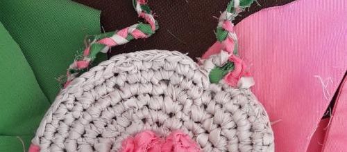 Petit sac rond à fleur rose