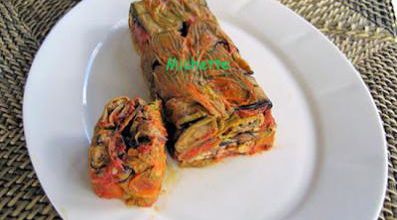 Terrine aux roulés d'aubergine, courgette, fleur de courgette, tomate