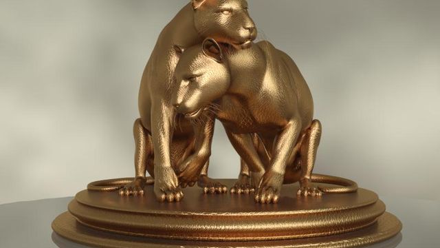 Fond d'écran : Statue dorée de couple de cougar