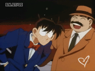 L'inspecteur Megure félicitant Shinichi
