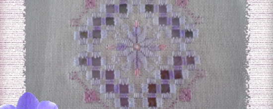 Petit ouvrage mauve et rose