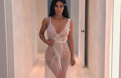 Did Kanye approve? Kim Kardashian posted a photo in a transparent dress on her naked body