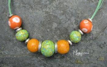 tour de cou et bracelet orange et vert