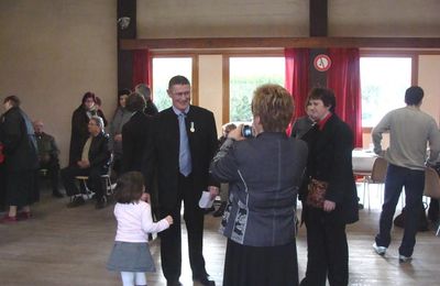La remise de Médaille d'argent à Michel Martin..