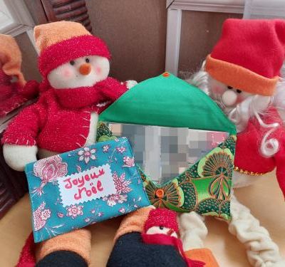 Une enveloppe cadeau en tissu pour Noël
